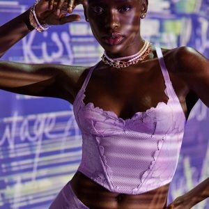This is the purple savage x fenty floral glow lace bustier.